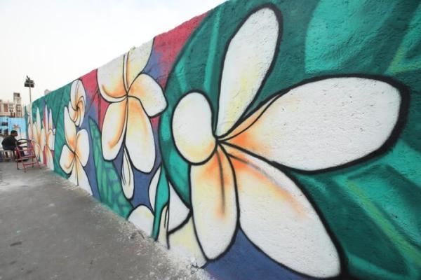 حال و هوای بهار در منطقه13 با 30 نقاشی دیواری